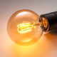 Lampa stołowa z żarówką, marmur czarny/kula brązowe szkło przezroczyste MARKFROST / MOLNART 595.826.47